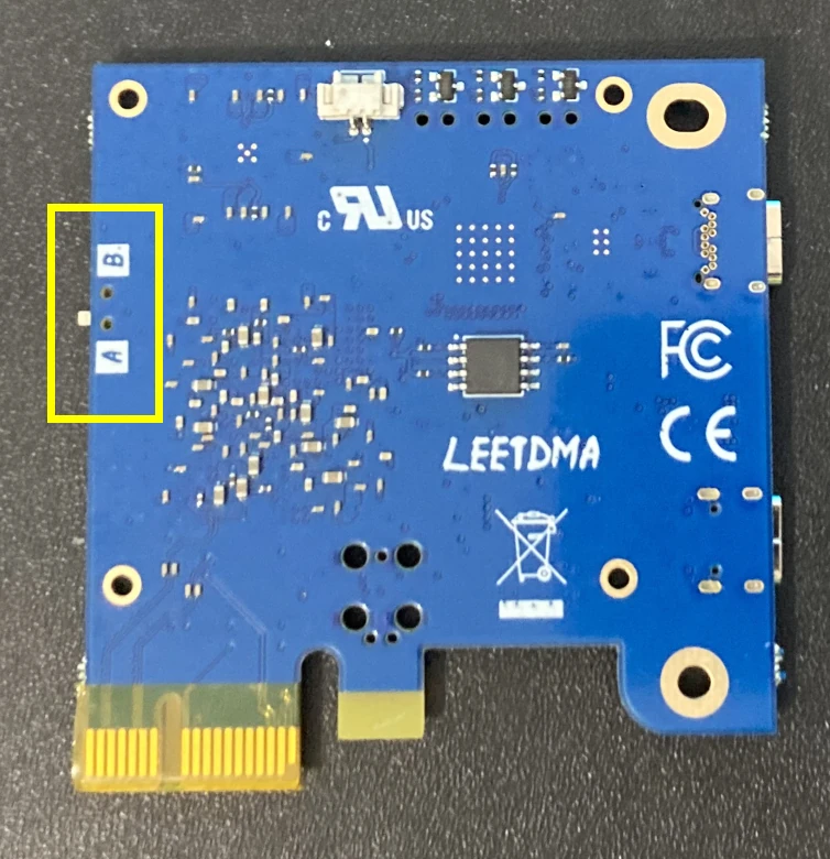 DMA 板卡背面的 A/B 电源开关，黄色方框标出开关位置